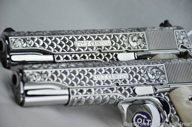 Left side of Hand Engraved Colt 1911 Customs