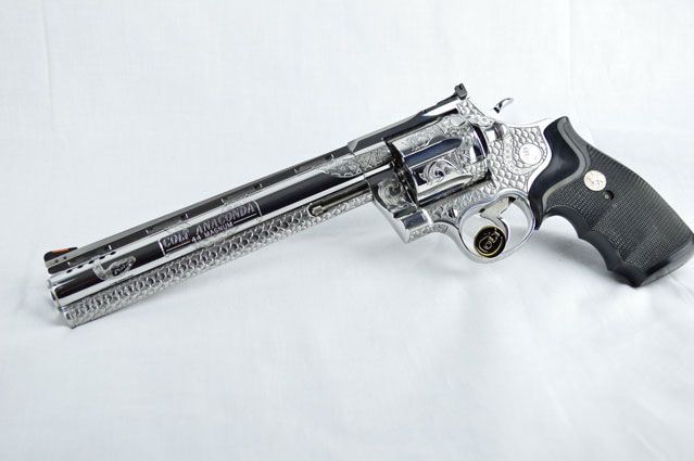 Left side of Hand Engraved snake gun
