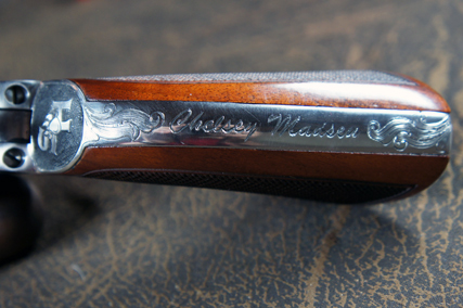 Closeup of the Engraved Runnin' Man Backstrop Bottom