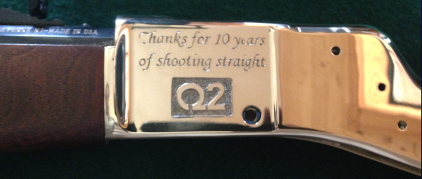Left Side of Henry Rifle engraved with Q2 Bank Logo
